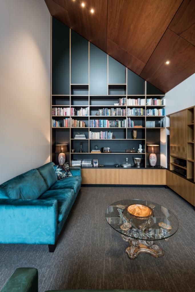 living room with shelving and storage in timber veneer